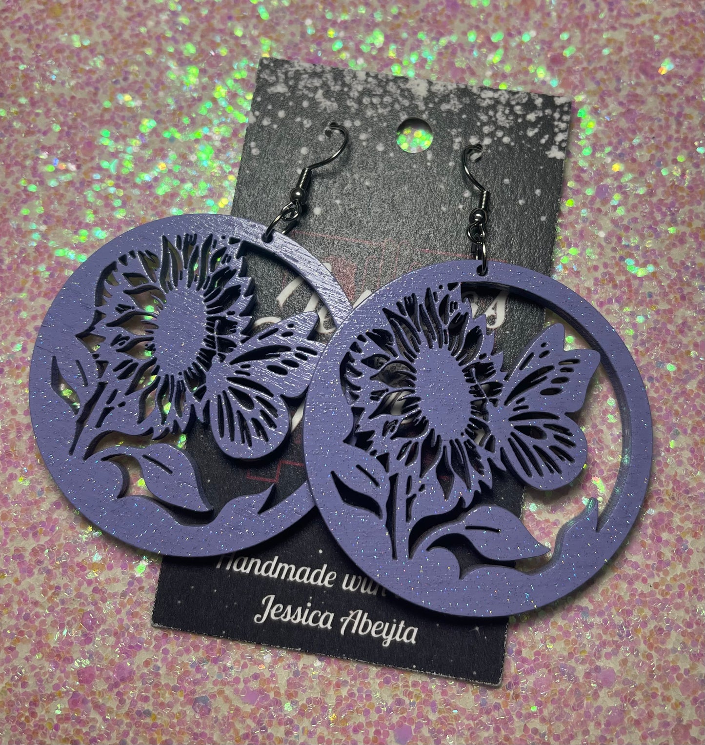 "Butterfly and sunflower hoop earrings"